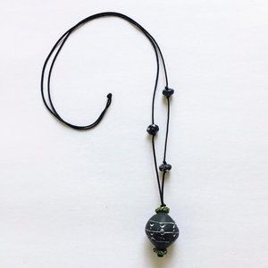 Long necklacs with hand made clay and recycled glass beads